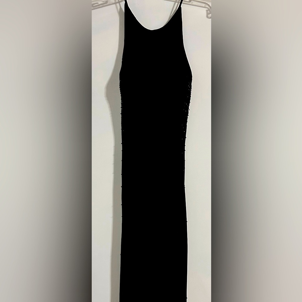 Black semi formal dress with high slit and rhinestone embelished trim